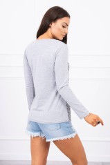 A blouse with imprinted gray