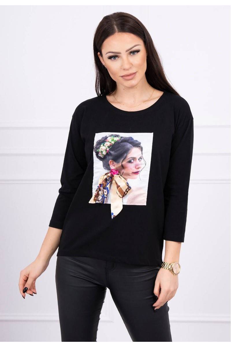 Black blouse with appliqué