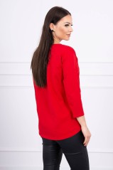 Red blouse with appliqué