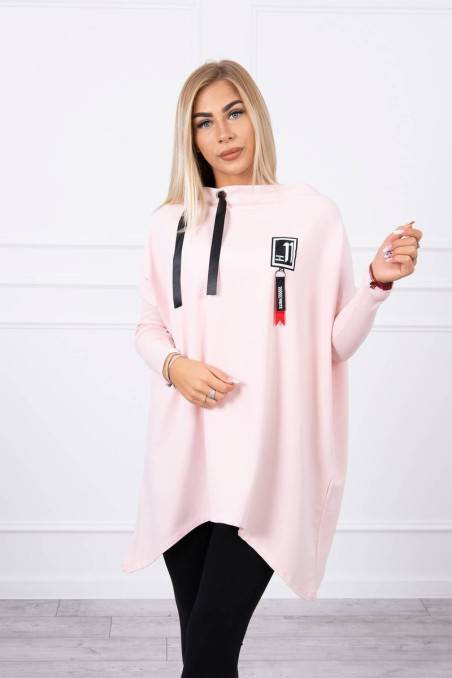 Oversize sweatshirt with asymmetrical sides powdered pink